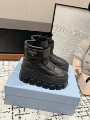 MONOLITH ANKLE BOOTS WITH STRAP IN BLACK CALFSKIN AND FLEECE LINING