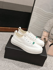 LACE-UP SNEAKERS IN WHITE CANVAS