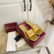 GUCCI 26S SLIDES IN GOLD CALFSKIN