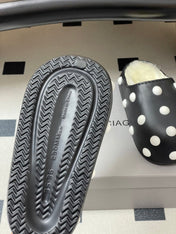 BALENCIAGA 25S FUR-LINED MULES IN BLACK AND WHITE FAUX LEATHER