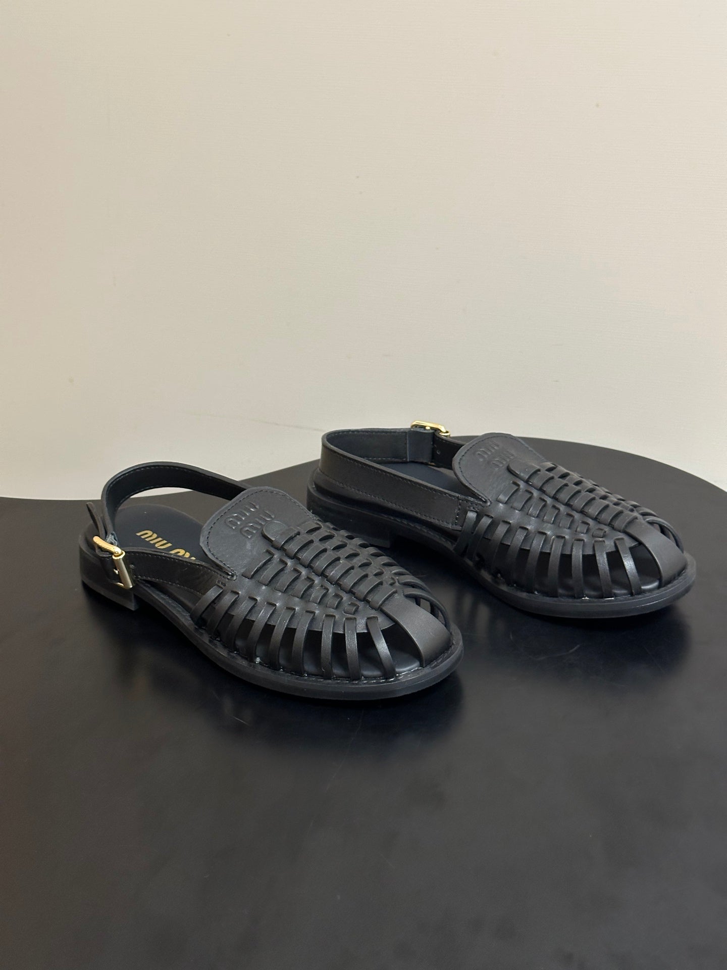 MIUMIU 26S SLINGBACK FISHERMAN SANDALS IN BLACK CALFSKIN
