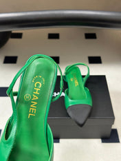 CHANEL 26S POINTED TOE SLINGBACKS IN GREEN LAMBSKIN AND BLACK FABRIC
