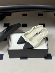 CHANEL 26S POINTED TOE SLINGBACKS IN WHITE LAMBSKIN AND BLACK FABRIC