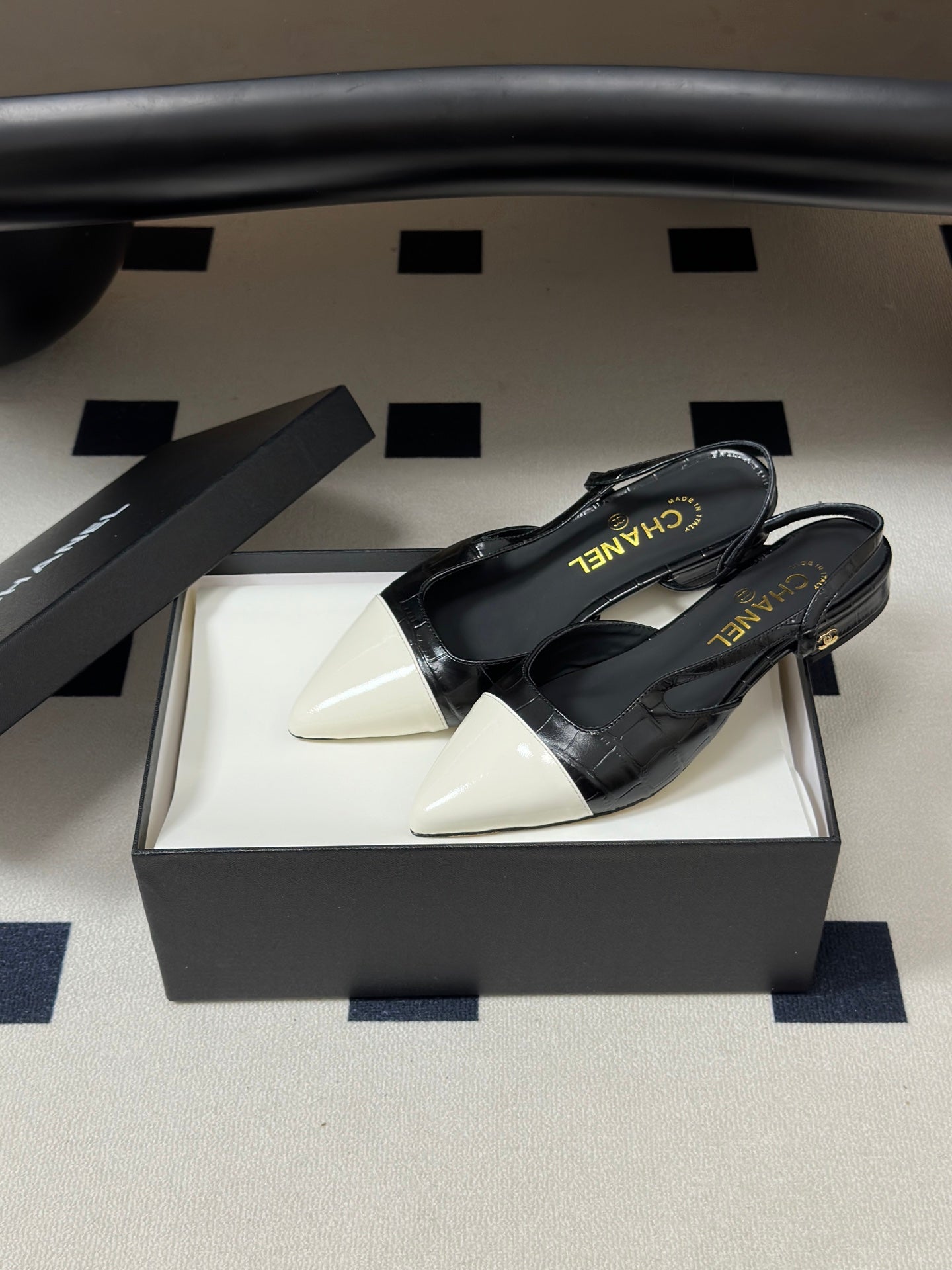 CHANEL 26S POINTED TOE SLINGBACKS IN BLACK MIX WHITE LAMBSKIN