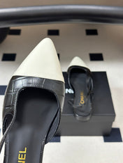 CHANEL 26S POINTED TOE SLINGBACKS IN BLACK MIX WHITE LAMBSKIN