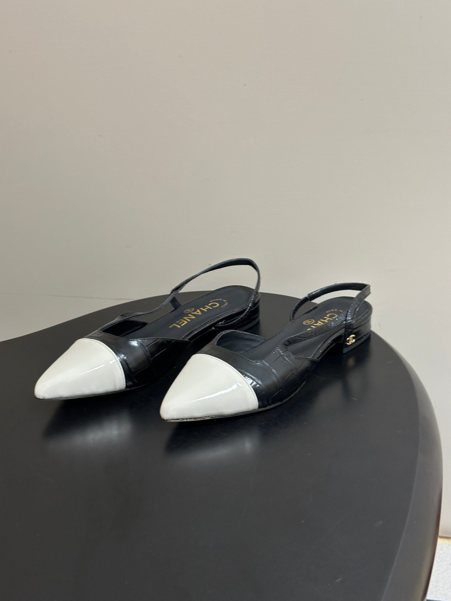 CHANEL 26S POINTED TOE SLINGBACKS IN BLACK MIX WHITE LAMBSKIN