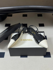 CHANEL 26S POINTED TOE SLINGBACKS IN BLACK MIX WHITE LAMBSKIN