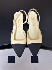 CHANEL 26S POINTED TOE SLINGBACKS IN CREAM LAMBSKIN AND BLACK FABRIC