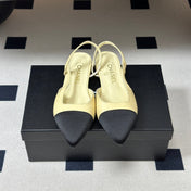 CHANEL 26S POINTED TOE SLINGBACKS IN CREAM LAMBSKIN AND BLACK FABRIC
