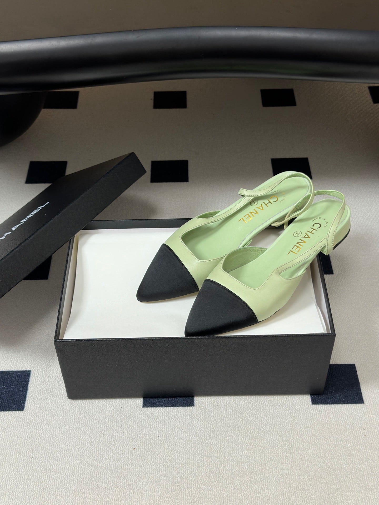 CHANEL 26S POINTED TOE SLINGBACKS IN PASTEL GREEN LAMBSKIN AND BLACK FABRIC