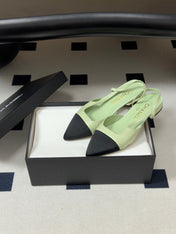 CHANEL 26S POINTED TOE SLINGBACKS IN PASTEL GREEN LAMBSKIN AND BLACK FABRIC