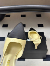 CHANEL 26S POINTED TOE HIGH HEEL SLINGBACKS 85 MM IN CREAM LAMBSKIN AND BLACK FABRIC