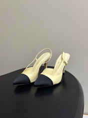 CHANEL 26S POINTED TOE HIGH HEEL SLINGBACKS 85 MM IN CREAM LAMBSKIN AND BLACK FABRIC