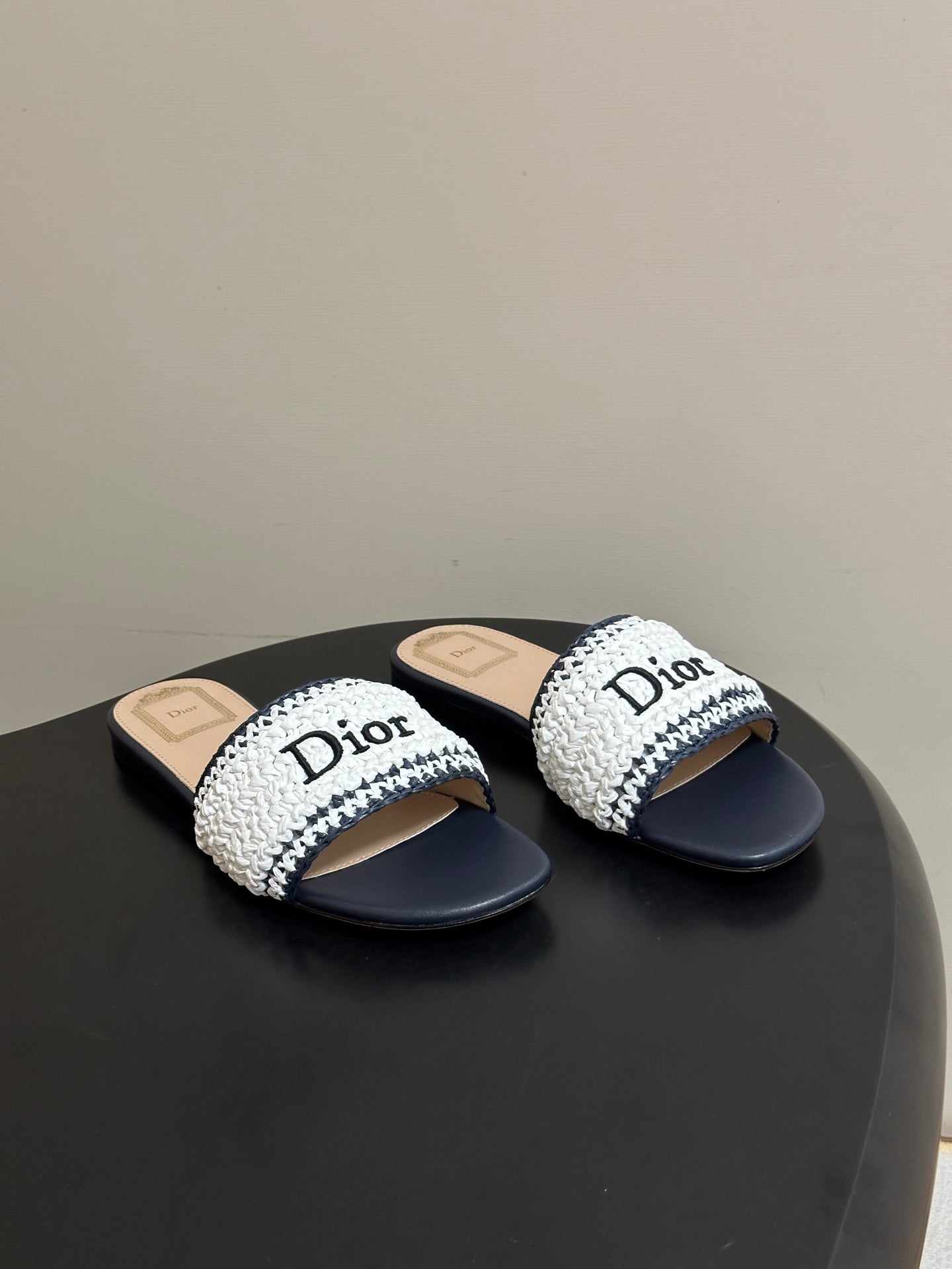 DIOR 26S FLAT SLIDE SANDALS IN WHITE AND NAVY BLUE RAFFIA