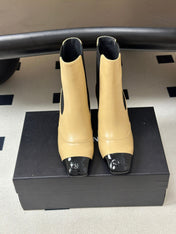 CHANEL 26S ANKLE BOOTS 60 MM IN BEIGE CALFSKIN AND BLACK PATENT