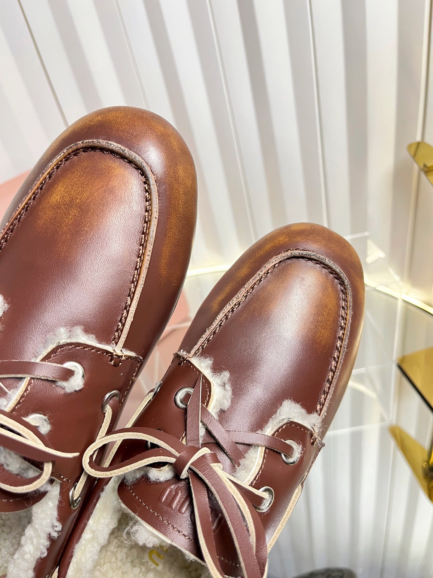 MIUMIU 26S FUR BOAT SHOES IN BROWN CALFSKIN