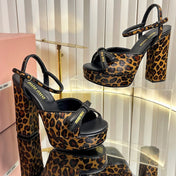 MIUMIU 26S PLATFORM ANKLE STRAP SANDALS 120MM IN LEOPARD PRINT CALF HAIR WITH BOW