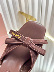 MIUMIU 26S MULE SANDALS 55MM IN DARK BROWN SUEDE WITH BOW