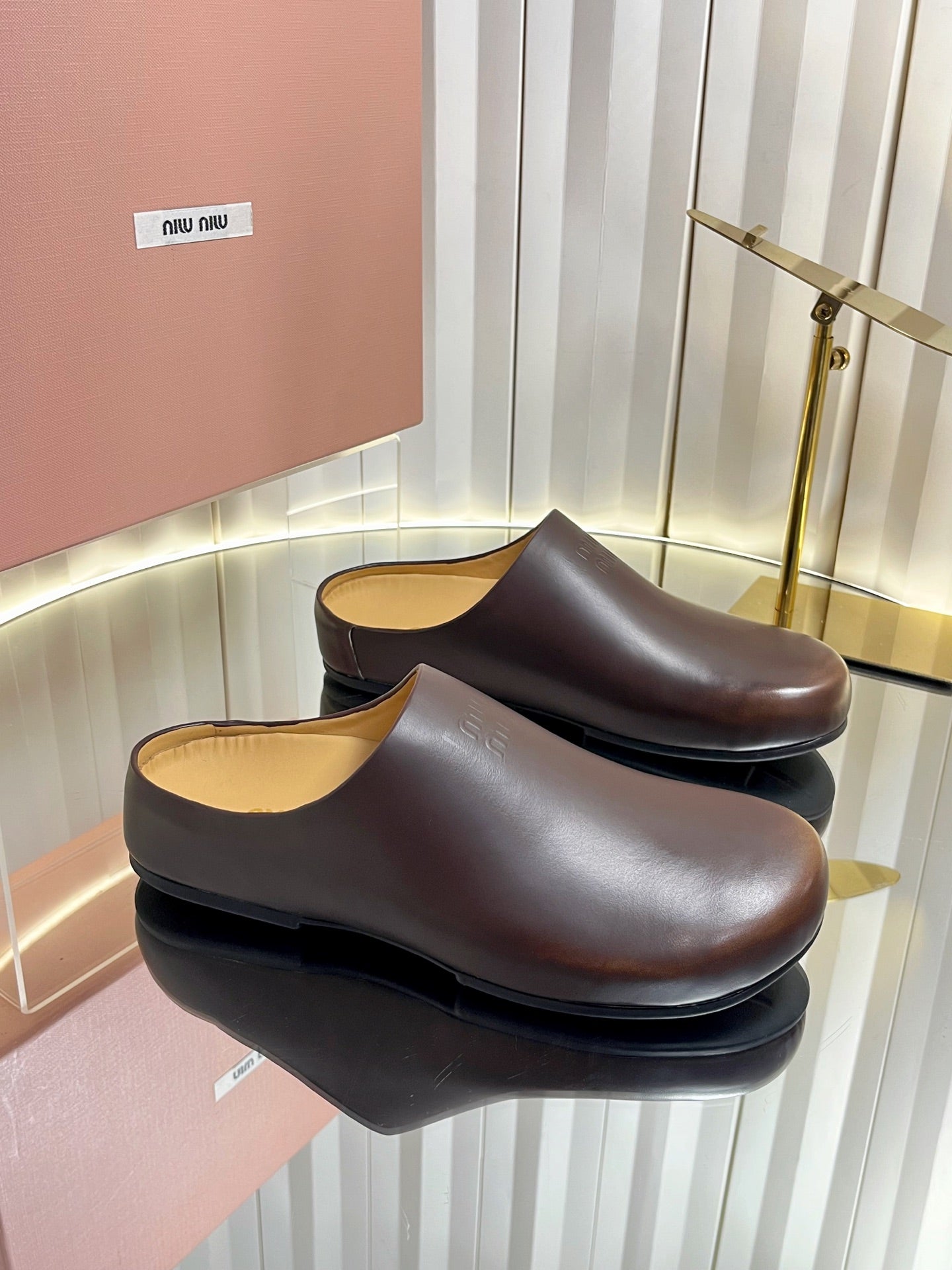 MIUMIU 26S CLOG MULES IN DARK BROWN CALFSKIN