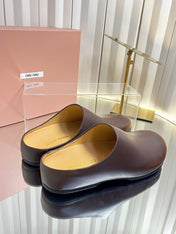 MIUMIU 26S CLOG MULES IN DARK BROWN CALFSKIN
