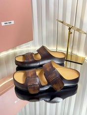 MIUMIU 26S DOUBLE-STRAP SLIDES IN CARAMEL BROWN CALFSKIN