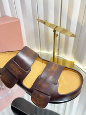 MIUMIU 26S DOUBLE-STRAP SLIDES IN CARAMEL BROWN CALFSKIN