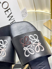 LOEWE 26S LOGO-EMBROIDERED SANDALS IN BLACK CALFSKIN