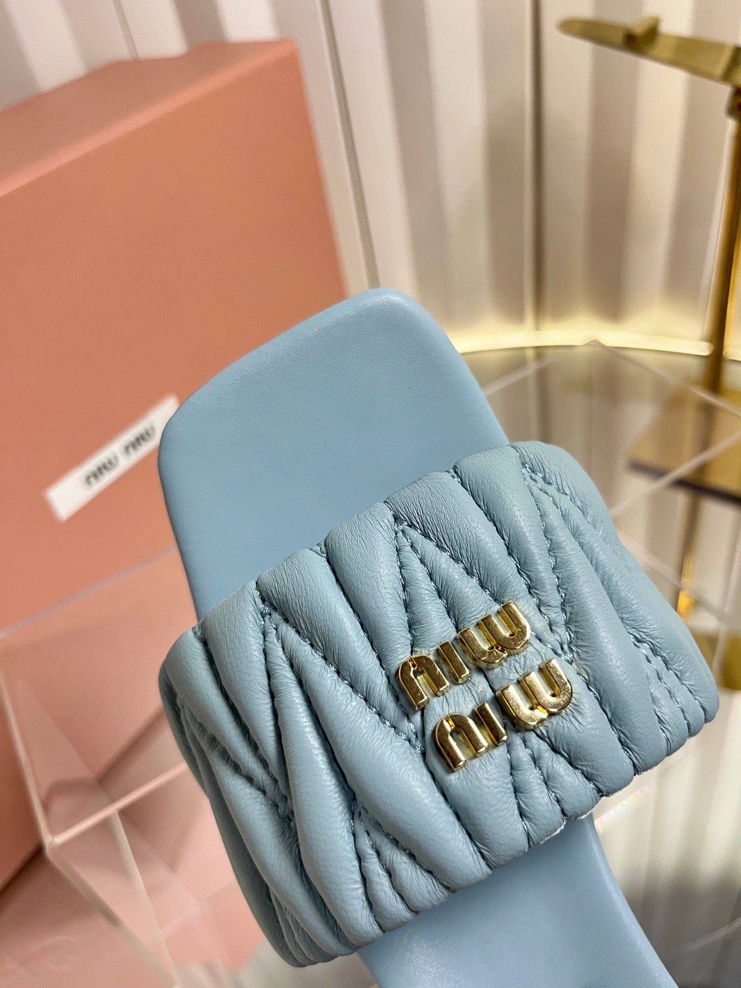 MIUMIU 26S PADDED MATELASSE MULE HEELS 65MM IN LIGHT BLUE CALFSKIN GOLD HARDWARE