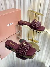 MIUMIU 26S MATELASSE SLIDES IN BURGUNDY RED CALFSKIN GOLD HARDWARE