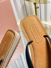 MIUMIU 26S THONG FLAT SANDALS IN BLACK CALFSKIN