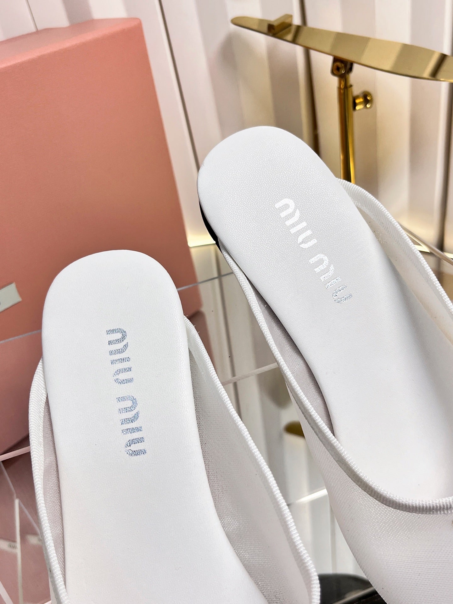 MIUMIU 26S FLAT MULES IN WHITE FABRIC AND LEATHER