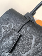 MADELEINE 30 IN BLACK MONOGRAM CALFSKIN EMBOSSED LOGO