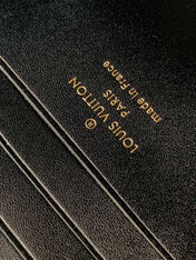 WALLET ON CHAIN CAPUCINES 23 IN BLACK SMOOTH CALFSKIN GOLD HARDWARE