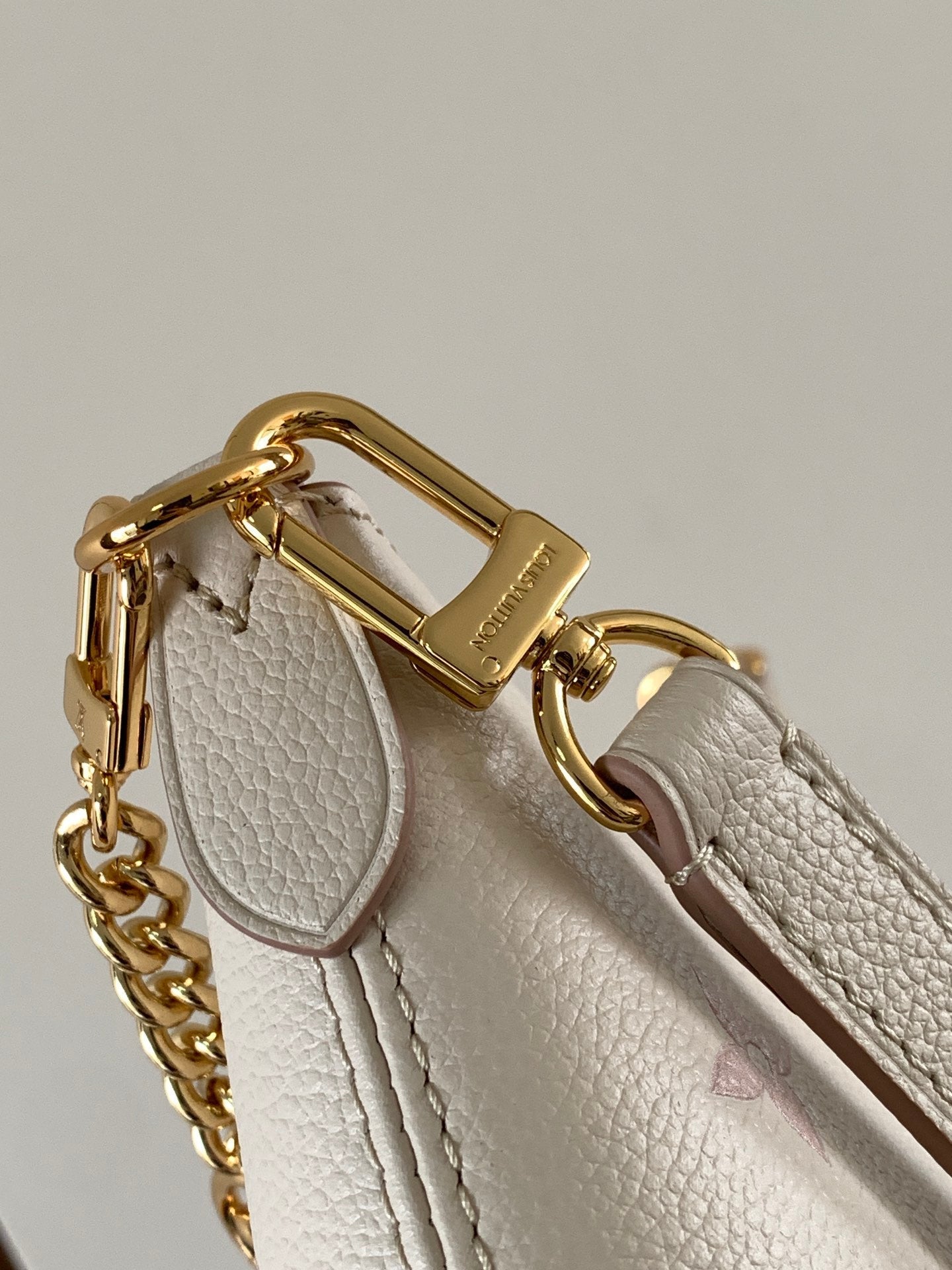 BOULOGNE 29 IN WHITE AND PINK MONOGRAM EMPREINTE CANVAS GOLD HARDWARE