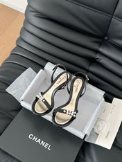 PEARL SANDAL IN BLACK AND GOLD LAMBSKIN 75 MM
