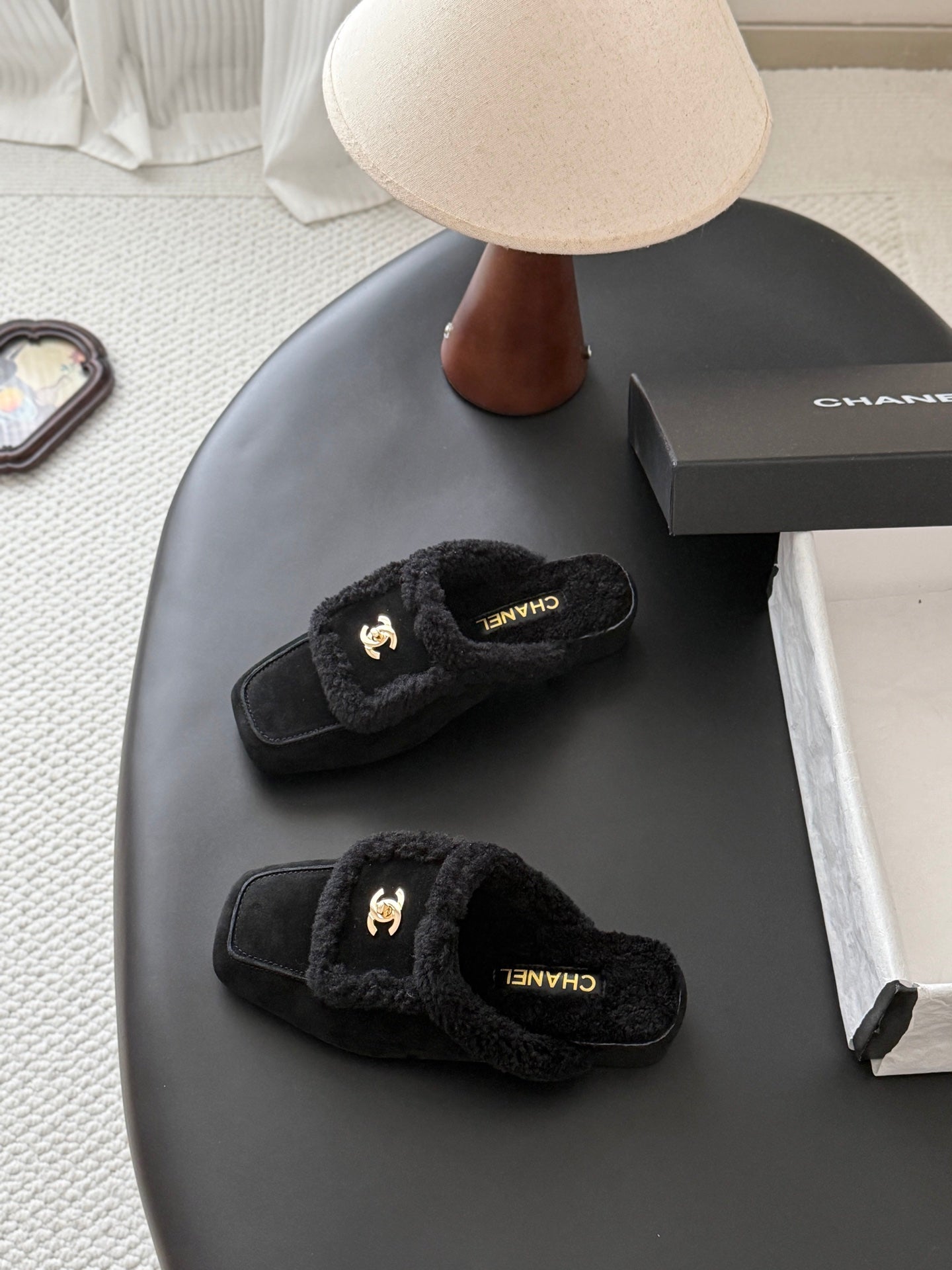 CHANEL 26S MULES IN BLACK SHEARLING AND SUEDE