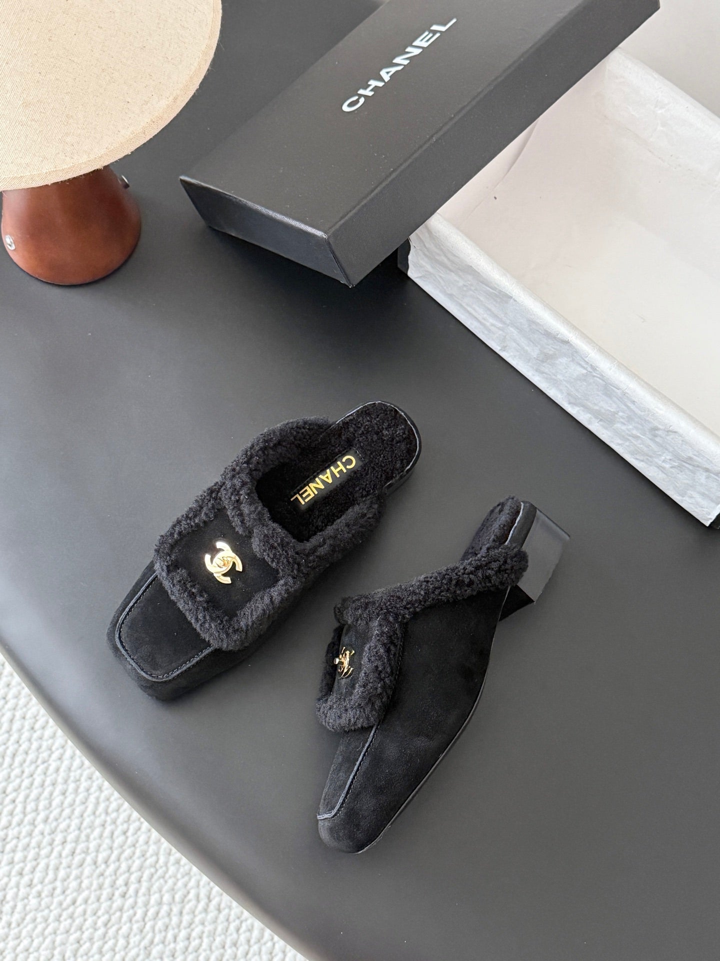 CHANEL 26S MULES IN BLACK SHEARLING AND SUEDE