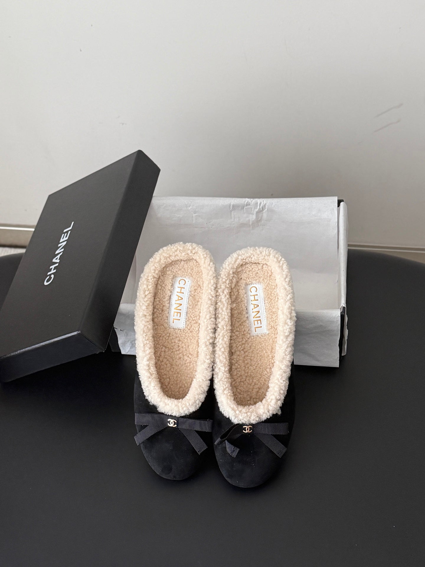CHANEL 26S MULES IN BLACK SUEDE AND SHEARLING