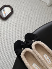 CHANEL 26S MULES IN BLACK SUEDE AND SHEARLING