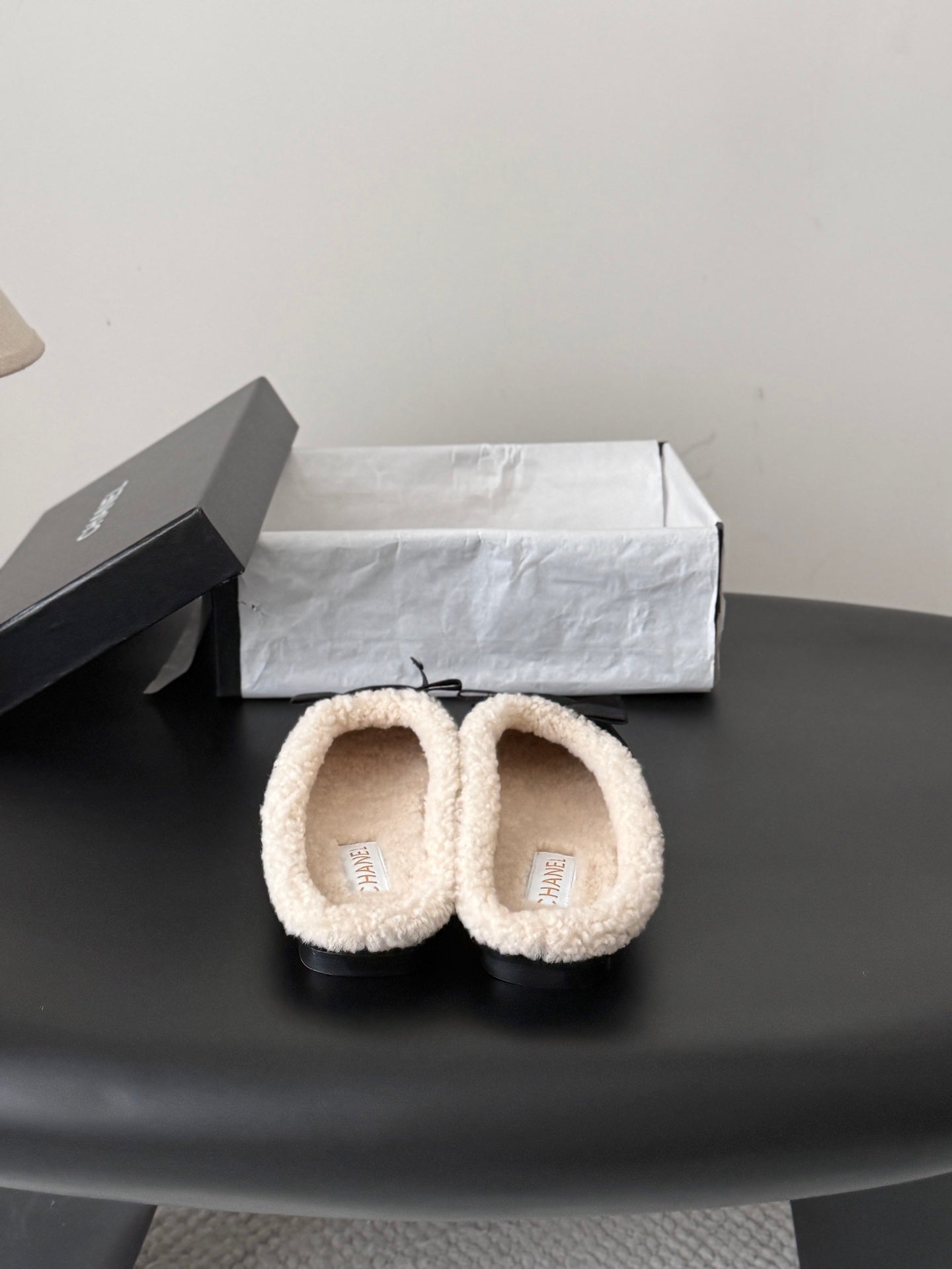 CHANEL 26S MULES IN BLACK SUEDE AND SHEARLING