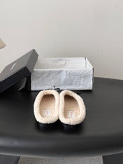 CHANEL 26S MULES IN BLACK SUEDE AND SHEARLING