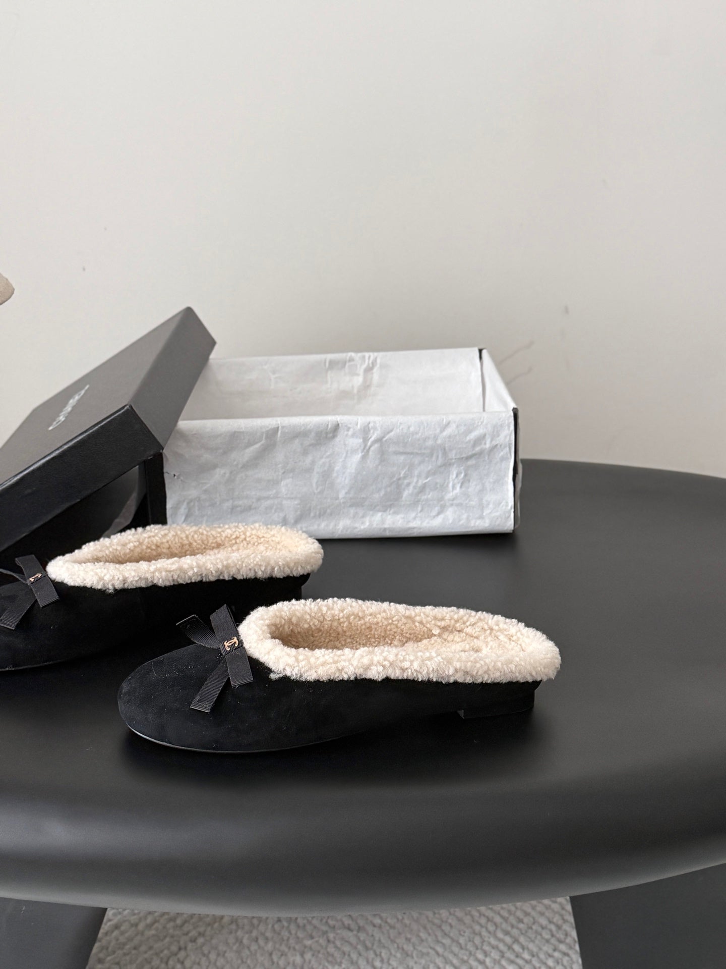 CHANEL 26S MULES IN BLACK SUEDE AND SHEARLING