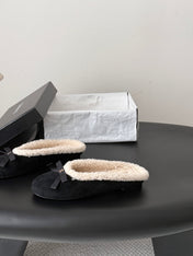 CHANEL 26S MULES IN BLACK SUEDE AND SHEARLING