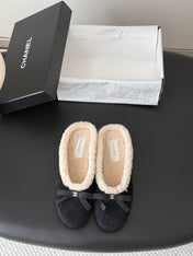 CHANEL 26S MULES IN BLACK SUEDE AND SHEARLING