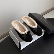 CHANEL 26S MULES IN BLACK SUEDE AND SHEARLING