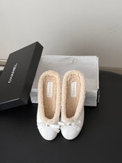 CHANEL 26S MULES IN WHITE LAMBSKIN AND SHEARLING