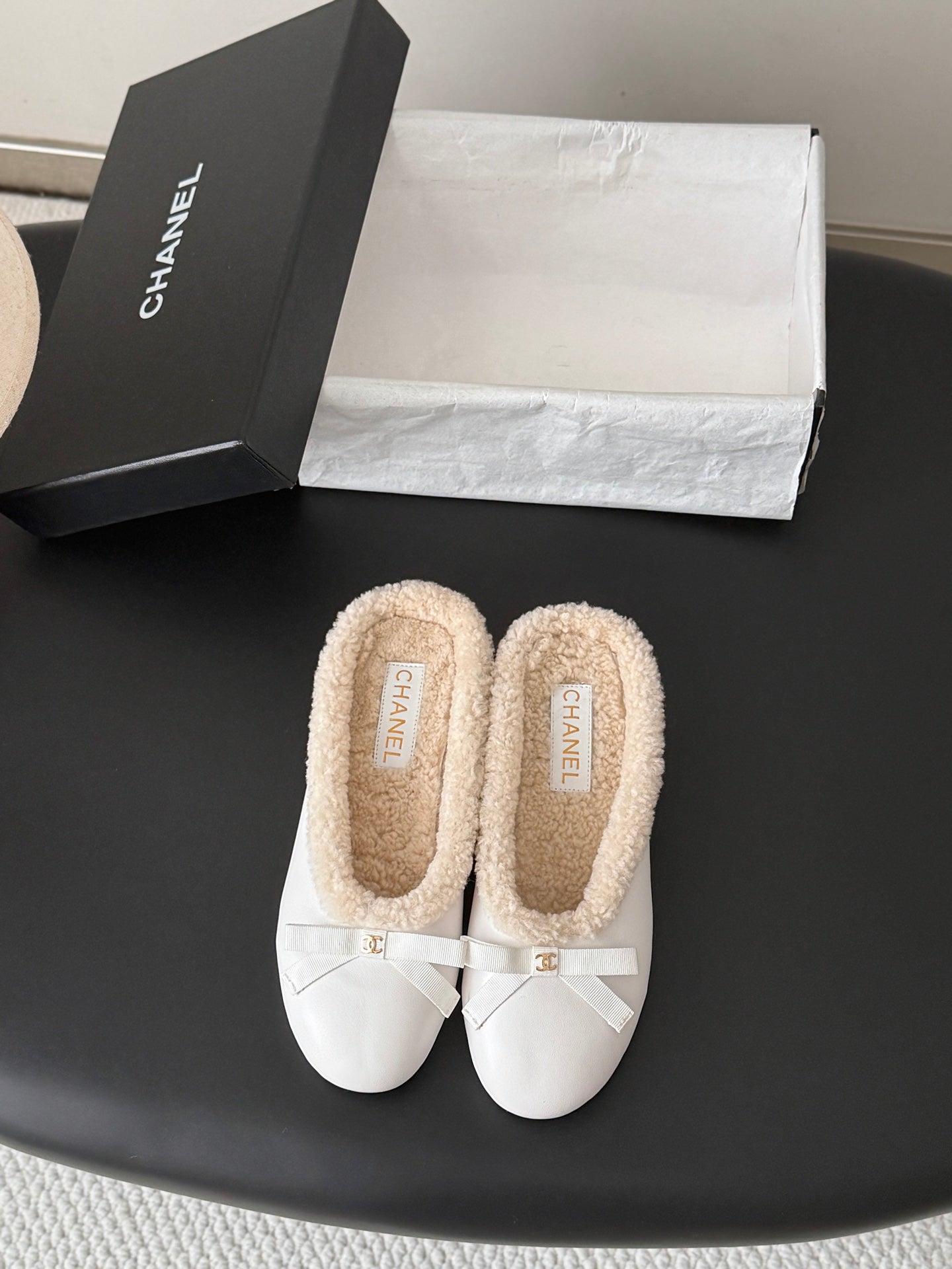 CHANEL 26S MULES IN WHITE LAMBSKIN AND SHEARLING
