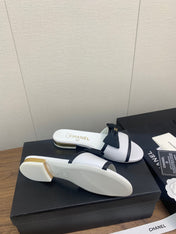 BOW SLIPPERS IN WHITE LAMBSKIN