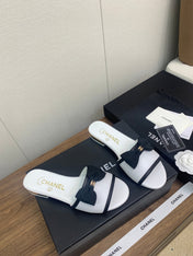 BOW SLIPPERS IN WHITE LAMBSKIN