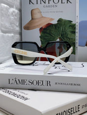 TRIOMPHE SUNGLASSES 548593 IN BLACK AND WHITE ACETATE